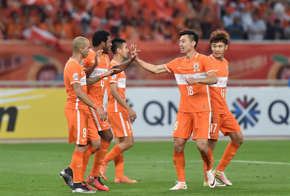 山东鲁能大连一方客场交锋,决战不分胜负 山东鲁能大连一方客场交锋,决战不分胜负